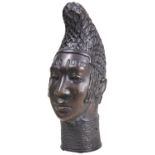 A SMALL BENIN BRONZE OF A QUEEN MOTHER’S HEAD WITH CONICAL HEAD DRESS. 20TH CENTURY. 29cms