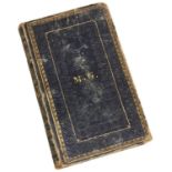 A VICTORIAN LEATHER GILT EMBOSSED NOTE BOOK WITH THE INITIALS 'M.G' containing personal musings