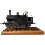 A ENGINEERED 3 1/2’ GAUGE MODEL OF  0-4-0 OPEN CAB NARROW GAUGE SADDLE TANK LOCOMOTIVE This nicely