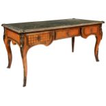A FRENCH LOUIS XV STYLE 19TH CENTURY BUREAU PLAT, the leather inset top with ormolu border, the