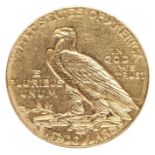 A RARE NEW ORLEANS MINT US INDIAN FIVE DOLLAR COIN with the 'O' mint mark just perceptible at the