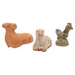 A GROUP OF THREE CHINESE POTTERY ANIMAL MODELS, the lot comprised of a terracotta ram, a cream