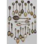 A COLLECTION OF TWENTY THREE SOUVENIR SILVER TEASPOONS, 20TH CENTURY, various shapes and styles,