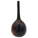 A BRETBY POTTERY BOTTLE VASE, CIRCA 1910, slender tapering neck with a globular body, attractive