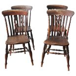 A SET OF FOUR WINDSOR DINING CHAIRS, 19TH CENTURY, with elm seats, raised on four turned baluster