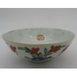 A SMALL CHINESE BOWL, 20TH CENTURY, the sides decorated with blossoming stems, the interior