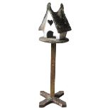 A VINTAGE RECONSTITUTED STONE BIRD HOUSE, CIRCA 1930, stylistic form with white painted walls,