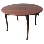 A GEORGE III MAHOGANY PAD FOOT DROP-LEAF DINING TABLE, simplistic form, hinged circular top raised