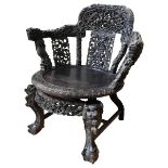 AN ORNATE CARVED CHINESE BOW BACK CHAIR, 19TH CENTURY, the pierced top rail, splats and arm supports