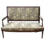 A TAPESTRY UPHOLSTERED SALON SETTEE, EARLY 20TH CENTURY, in the regency style, with overstuff