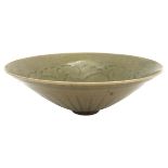 A MOULDED CHINESE 'YAOZHOU' CELADON-GLAZED CONICLE BOWL POSSIBLY NORTHERN SONG DYNASTY the