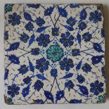 AN IZNIK POTTERY TILE, TURKEY, 19TH CENTURY, square form, decorated underglaze in turquoise and