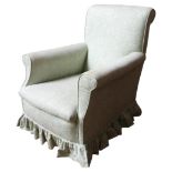 A VINTAGE ARMCHAIR, CIRCA 1930, scroll back and scroll arms, covered in a mottled pale green,