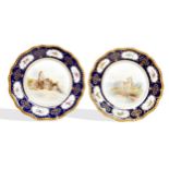 A PAIR OF ROYAL WORCESTER PLATES, DECORATED BY JOHN STINTON with a scene of Hastings Castle, the