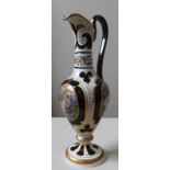 AN ATTRACTIVE BOHEMIAN GLASS EWER, 19TH CENTURY, overlaid emerald glass, the oval reserves painted