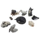 A GROUP OF NINE ROYAL COPENHAGEN PORCELAIN MODELS, the lot comprised of a model of boy with puppy,