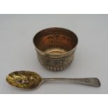 A SILVER BOWL AND SILVER BERRY SPOON, gadrooned waisted bowl with bright cut foliate decoration,