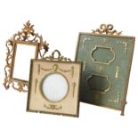 A GROUP OF THREE VINTAGE BRASS PHOTO FRAMES, EARLY 20TH CENTURY, two glazed examples with ornate