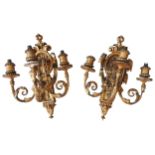 A PAIR OF ORNATE GILT WOOD TRIPLE LIGHT WALL SCONCES, EARLY 20TH CENTURY, three scroll foliate