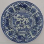 A KRAAK STYLE PORCELAIN DISH, 20TH CENTURY, decorated with deer in a garden setting, the rim with