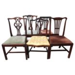A GROUP OF FIVE 19TH CENTURY MAHOGANY DINING CHAIRS, in the Chippendale manner with ornate carved