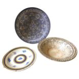 A 19TH CENTURY QUIMPER WARE PLATE AND AN AMERICAN POTTERY BOWL, the Quimper plate with concentric