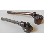 A COPPER ALLOY BRUSH HOLDER WITH RETICULATED STEM, THE POT WITH HINGED LID AND SEATED SCHOLAR, AND