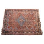 A HAND KNOTTED PERSIAN HAMADAN RUG, EARLY 20TH CENTURY, deep border pattern with a central lozenge