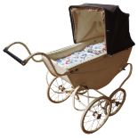 A VINTAGE COACH BUILT CHILD'S PRAM, CIRCA 1955, cream coloured carriage with tan awning 77 x 99 x 35