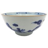 A NANKING CARGO BLUE AND WHITE BOWL, CIRCA 1750, the sides decorated with a garden scene, with