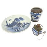 A CHINESE BLUE AND WHITE DISH QING DYNASTY (1644-1911) decorated with two horses, 27.5cm diam;