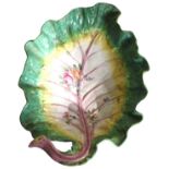 A CHELSEA PORCELAIN LEAF DISH, CIRCA 1755, naturalistically modelled as an open cabbage leaf, with