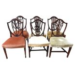 TWO PAIRS OF MAHOGANY BALLOON BACK DINING CHAIRS, 19TH CENTURY, shield form with intricate carved