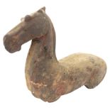 A CHINESE TERRACOTTA HORSE PROBABLY HAN DYNASTY (206BC - AD220) modelled as a torso and head 31cm