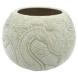 A CHINESE CARVED CELADON 'DRAGON' JAR LATE QING / REPUBLIC PERIOD the sides carved with two