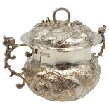 A SILVER PORRINGER AND COVER, repousse decoration depicting a lion and unicorn amongst a profusion