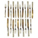 ELEVEN SILVER AND MOTHER OF PEARL HANDLED FRUIT KNIVES AND FORKS, with bright cut scroll foliate