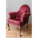 A QUEEN ANNE STYLE ARMCHAIR, CIRCA 1920, attractive arch back form with scroll arms, covered in