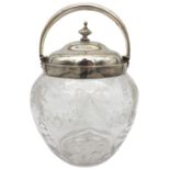 A LATE VICTORIAN SILVER MOUNTED GLASS JAR, LONDON 1900, the moulded globular sides engraved with