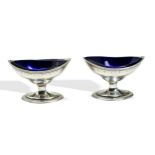 A PAIR OF GEORGE III SILVER SALTS, navette form with bright cut engraved decoration and monogram