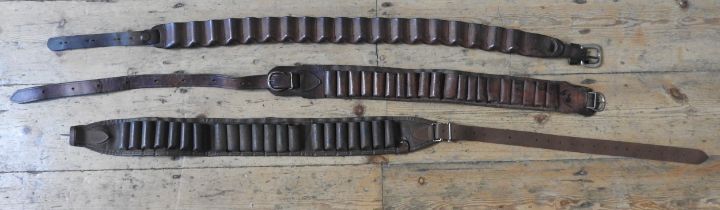 THREE VINTAGE LEATHER CARTRIDGE BELTS, 19TH CENTURY 127 cm max