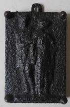 A 19TH CENTURY CAST IRON PLAQUE, decorated in low relief depicting two robed Roman male and female