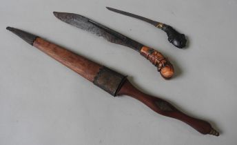 A MALAYSIAN KNIFE WITH CARVED BONE HANDLE AND STEEL BLADE, another slender example and an Indian