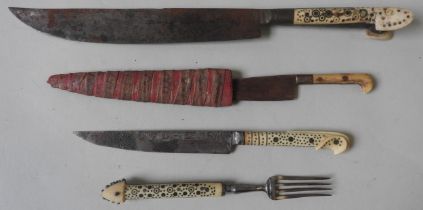 AN INDO PERSIAN KNIFE, the bone handle with inlaid decoration, a knife and a near matching fork with