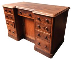 A VICTORIAN MAHOGANY WRITING DESK, CIRCA 1870, breakfront rectangular top with moulded edge above
