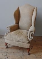 A HIGH BACK WING ARMCHAIR, 20TH CENTURY, covered in pale gold chenille material 119 x 78 x 60 cm