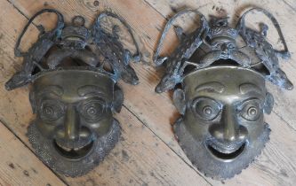 A PAIR OF AFRICAN GILT BRONZE TRIBAL MASKS, probably Bamoun, Cameroon, early 20th century 31 x 24 cm