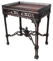 A SILVER TABLE, 20TH CENTURY, the rectangular top surrounded by a pierced gallery, above a pierced