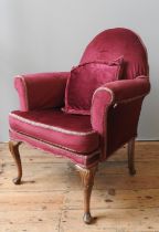 A QUEEN ANNE STYLE ARMCHAIR, CIRCA 1920, attractive arch back form with scroll arms, covered in