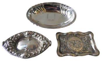 AN OVAL GERMAN SILVER BOWL, NAVETTE FORM BOWL AND A DECORATED PIN TRAY, the German bowl marked .835,